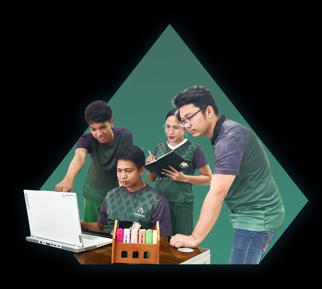A trio of men dressed in armada logics green uniform shirts stands side by side, exuding camaraderie and positivity.